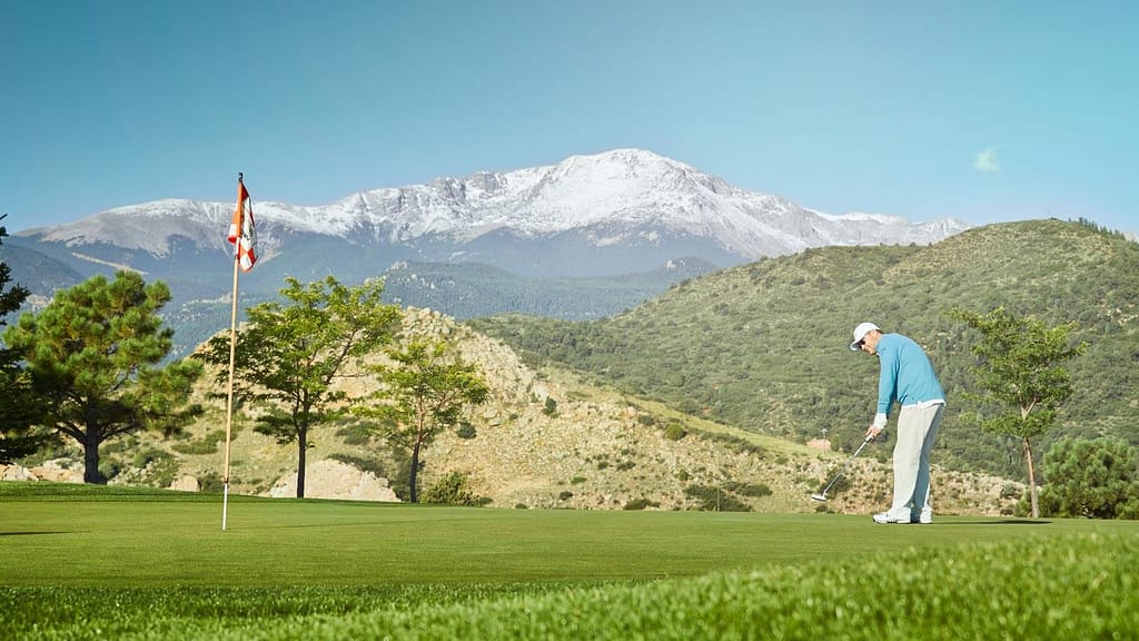 golfer at Kissing Camels Golf Club, Garden of the Gods Club