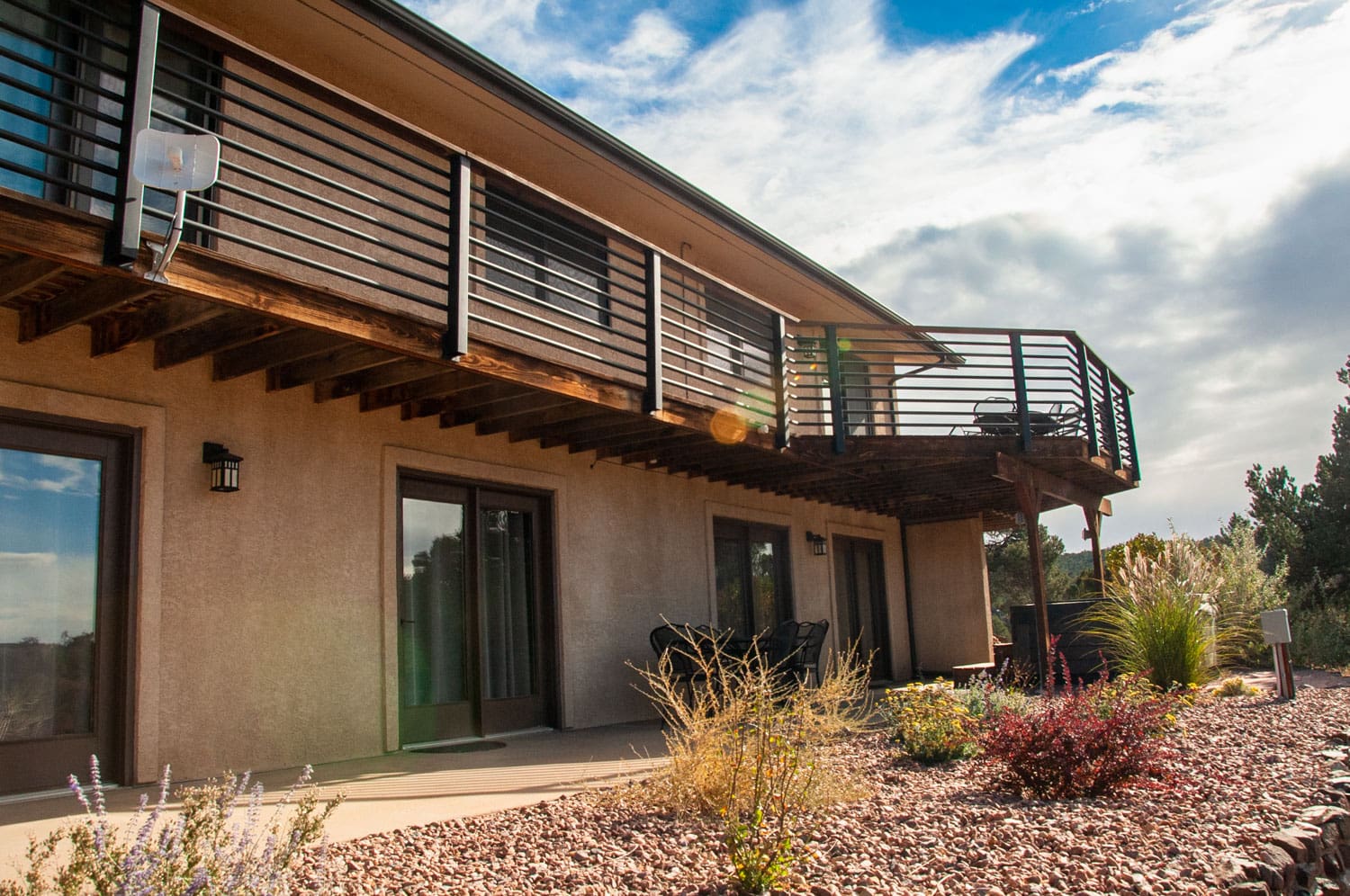 every bedroom features french doors leading to patio with mountain views