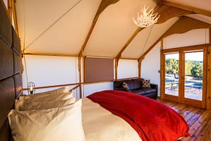 Comfortable furnishings in glamping tent at Royal Gorge Cabins