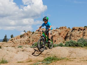 child mountain biking in Colorado