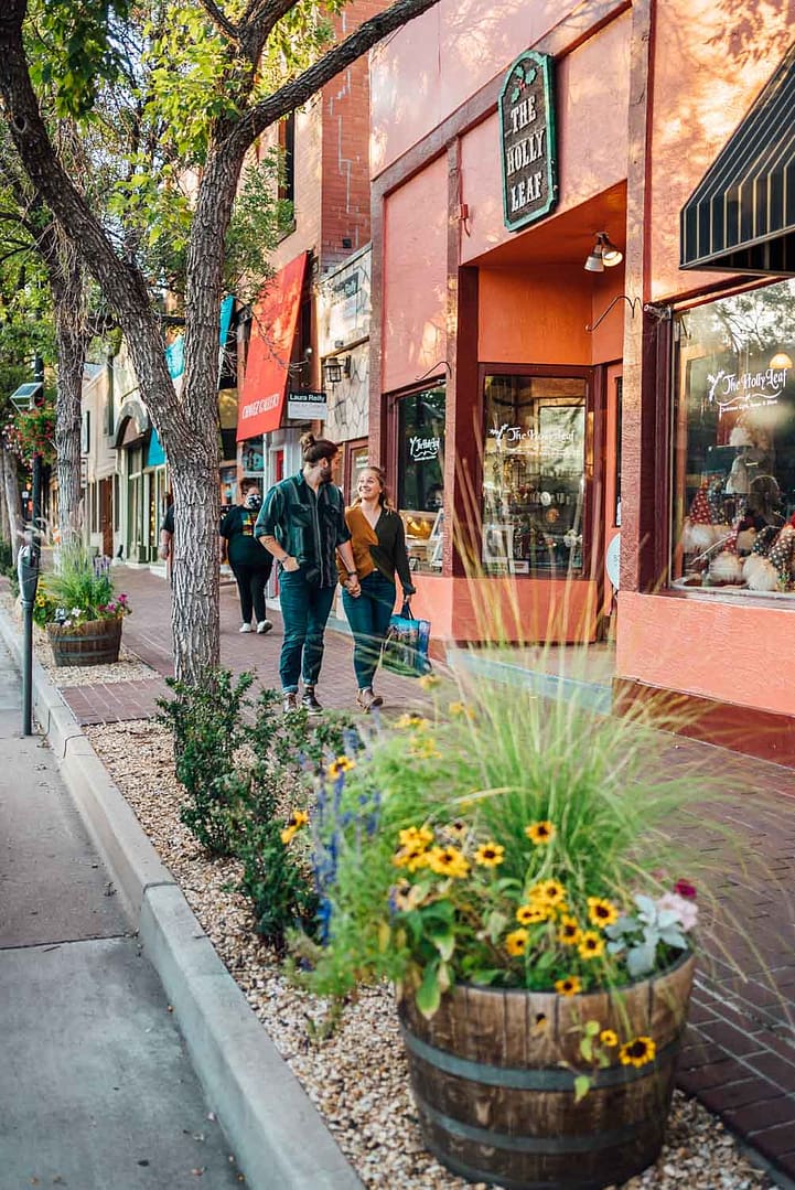 couple walking on Old Colorado City sidewalk