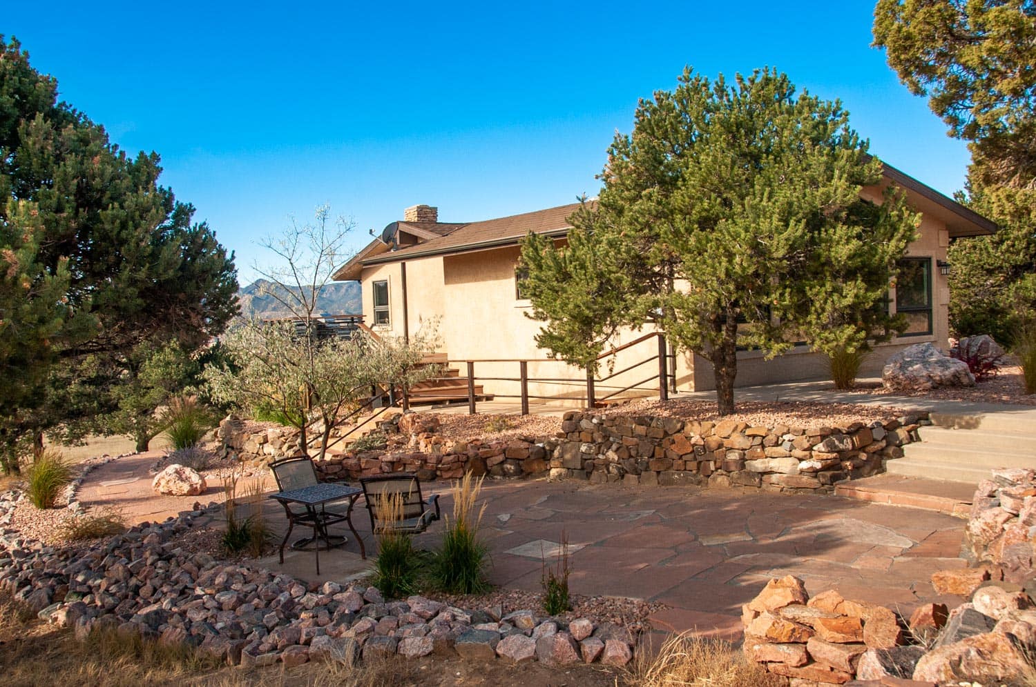 multiple outdoor living areas perfect for gathering family at Pinon House