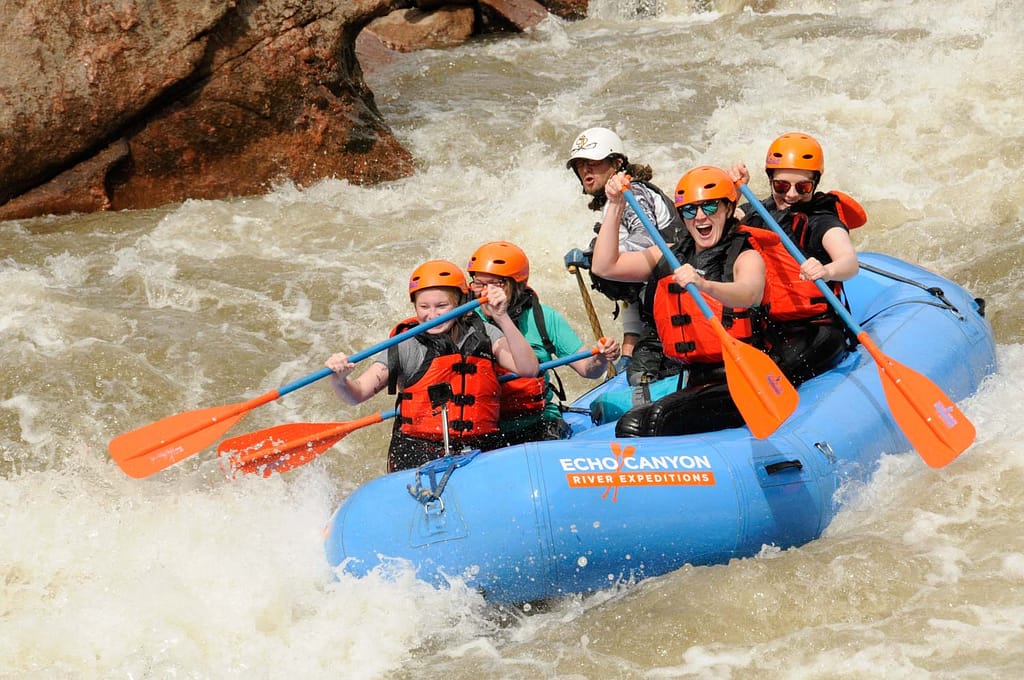 A group of paddlers navigate Sunshine Rapid in the Royal Gorge