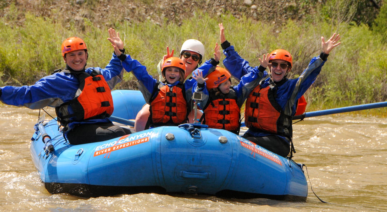 Family whitewater rafting on the Arkansas River near Colorado Springs in summer