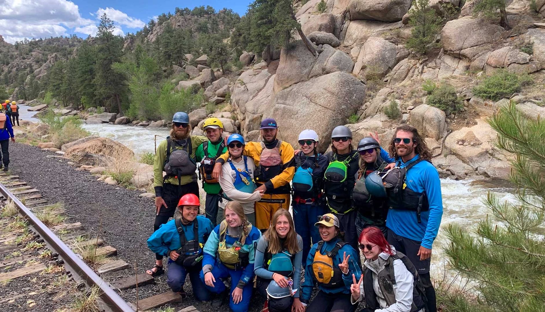 Guides pose while a scouting a rapid in Browns Canyon on the Arkansas River