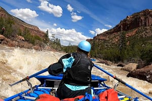 an Echo Canyon Guide navigates Snaggletooth Rapid on the Dolores River