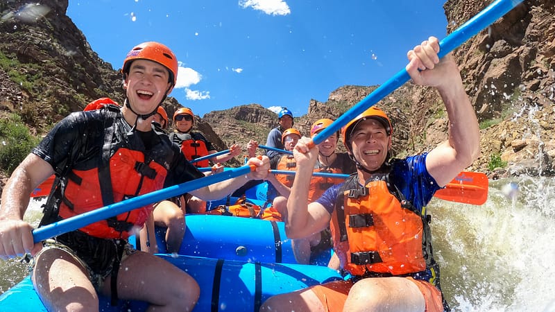 Echo Canyon River Expeditions rafters paddling Class IV rapids in the Royal Gorge of the Arkansas River