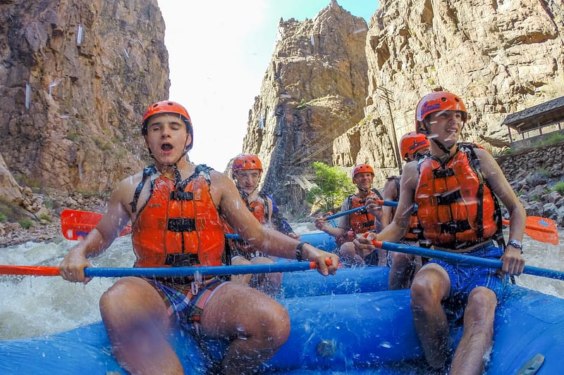 Rafters are splashed as they paddle Wallslammer Rapid in the Royal Gorge