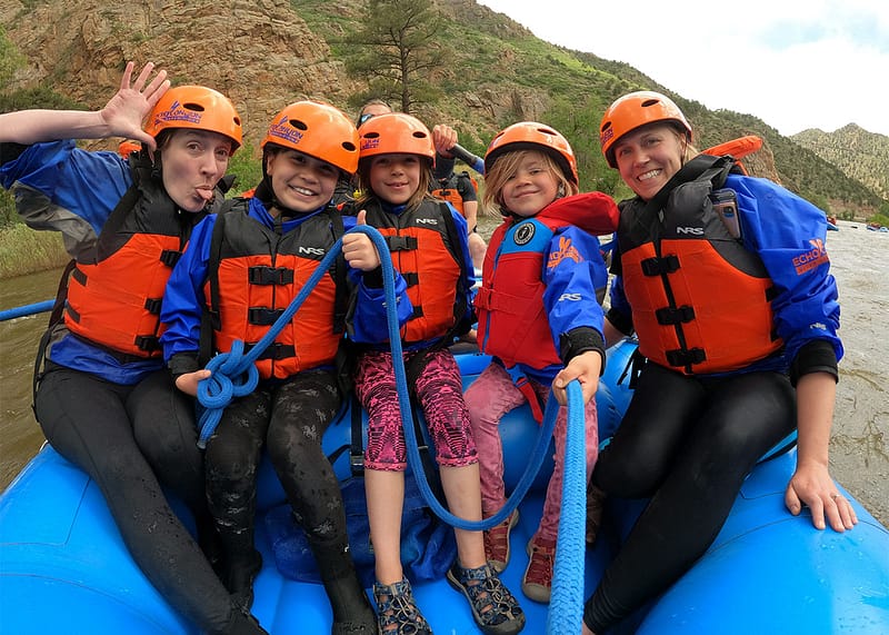 Family enjoying a budget-friendly rafting vacation on the Arkansas River with Echo Canyon River Expeditions in Colorado